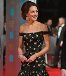 Guests pose on the red carpet for the 70th British Academy Film Awards