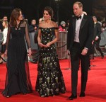 Guests pose on the red carpet for the 70th British Academy Film Awards