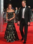 Guests pose on the red carpet for the 70th British Academy Film Awards