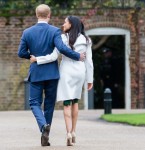 Prince Harry and Meghan Markle arrive at a photocall to officially announce their engagement at the Sunken Garden at Kensington Palace