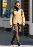 Newly-single Justin Theroux goes for a solo stroll through sunny downtown Manhattan without his wedding ring