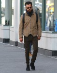 Newly-single Justin Theroux goes for a solo stroll through sunny downtown Manhattan without his wedding ring