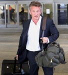 Sean Penn looks dapper arriving to LAX