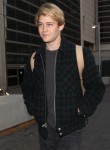 Joe Alwyn touches down in Los Angeles from London