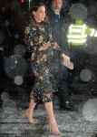 Catherine, Duchess of Cambridge braves the snowy weather at The National Portrait Gallery