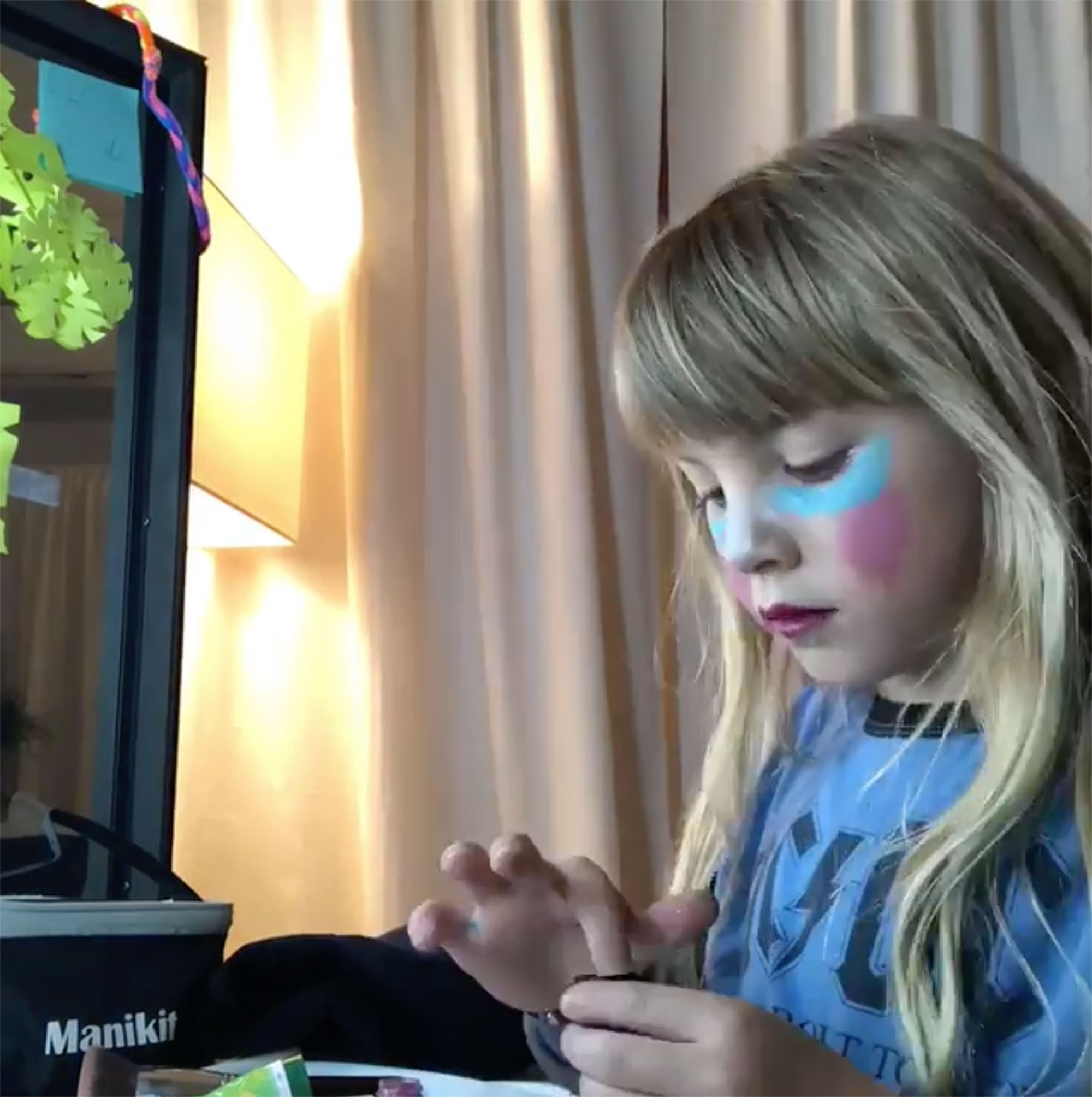 Willow Sage Hart hard at work applying makeup during a tutorial on Pink's Instagram