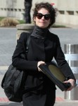 Neri Oxman rocks all black and carries "The Voyager Record'' while heading to class at MIT