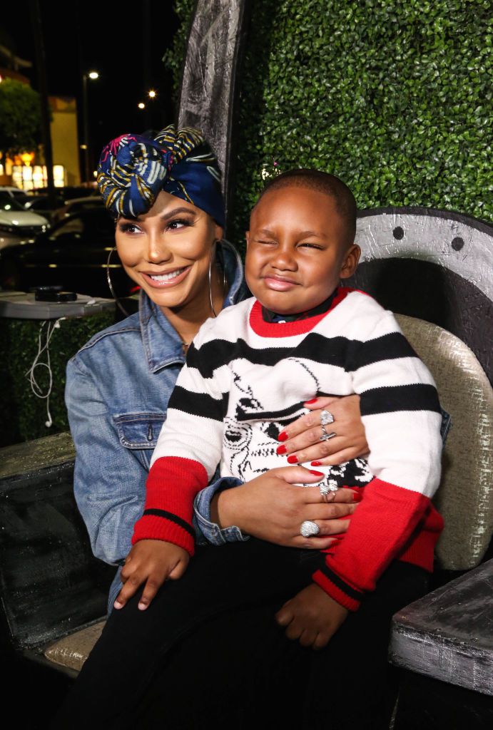 LOS ANGELES, CA - FEBRUARY 14:  Tamar Braxton and son Logan Vincent Herbert attend the Pan African Film Festival red carpet and screening of Marvel Studios "Black Panther" at Cinemark Baldwin Hills Crenshaw 15 on February 14, 2018 in Los Angeles, California.