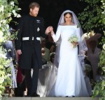 Prince Harry and Meghan Markle leave St George's Chapel in Windsor Castle after their wedding