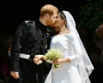 Prince Harry and Meghan Markle leave St George's Chapel in Windsor Castle after their wedding