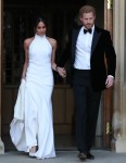 The newly married Duke and Duchess of Sussex, Meghan Markle and Prince Harry, leaving Windsor Castle after their wedding to attend an evening reception at Frogmore House, hosted by the Prince of Wales