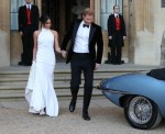 The newly married Duke and Duchess of Sussex, Meghan Markle and Prince Harry, leaving Windsor Castle after their wedding to attend an evening reception at Frogmore House, hosted by the Prince of Wales