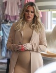 Khloe Kardashian and Kris Jenner shop for girl baby clothes at Couture Kids