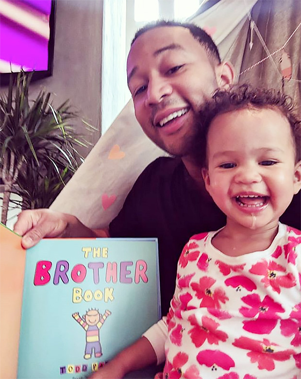 John Legend with his baby daughter Luna