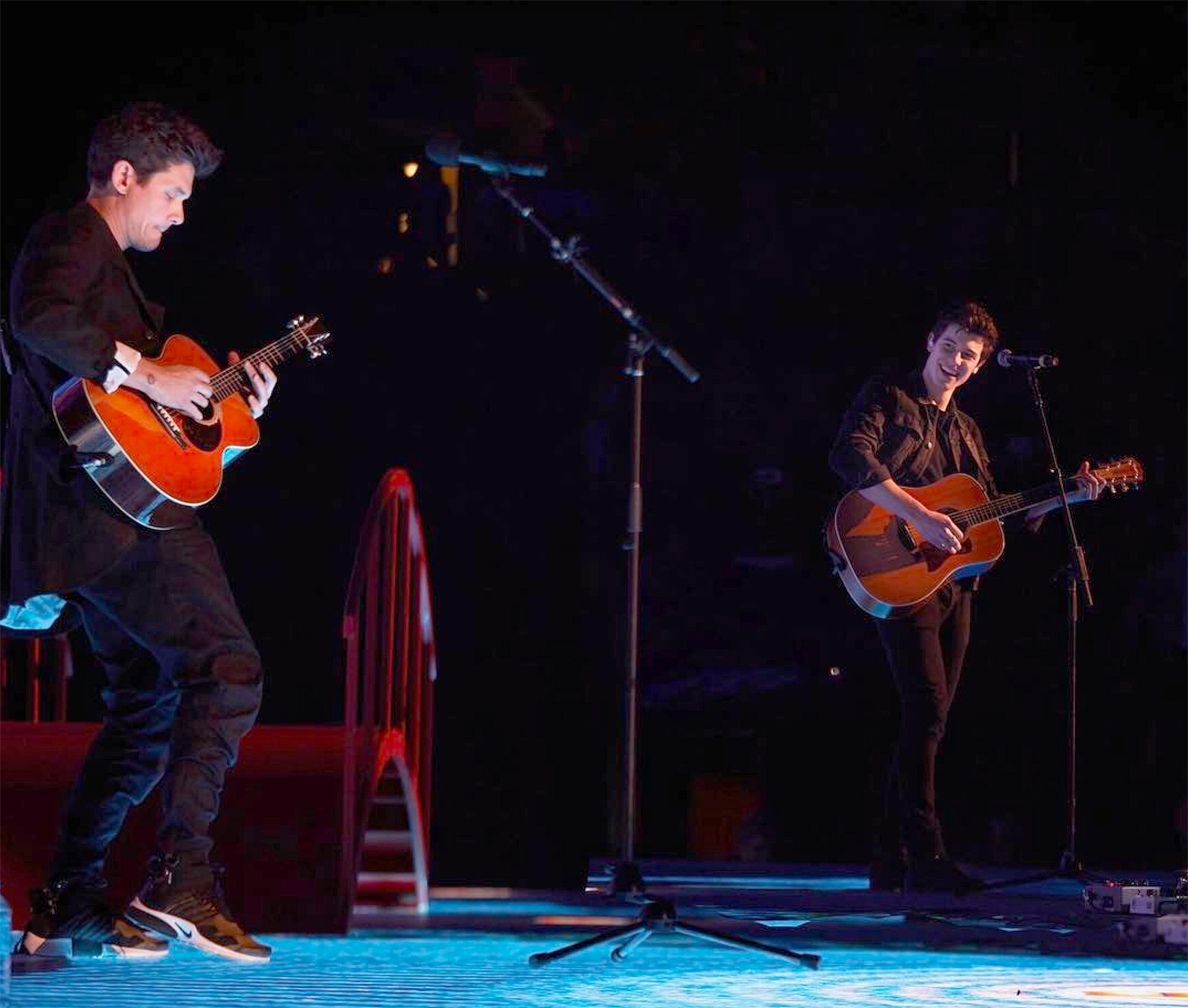 Shawn Mendes and John Mayer perform their mash-up in Toronto during one of Mayer's concerts.