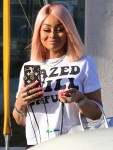 Blac Chyna gets into her white Ferrari while out and about